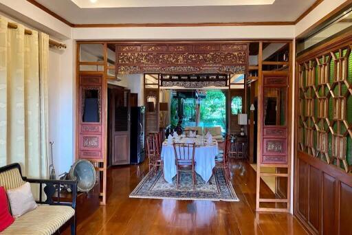 Elegant dining room with wooden furniture and intricate decor