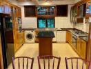 Spacious kitchen with wooden cabinets and modern appliances