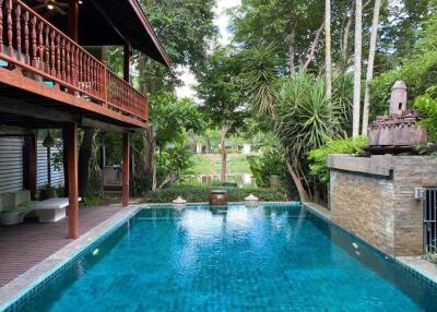 Beautiful outdoor area with pool and greenery