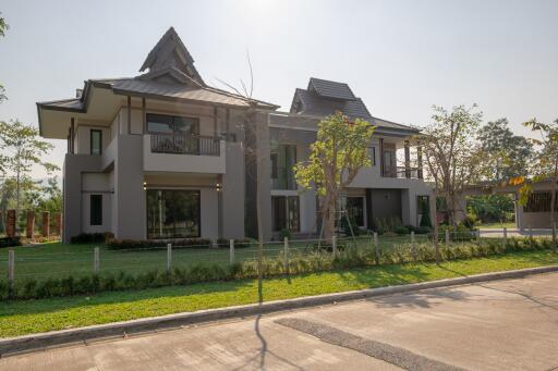 Modern two-story house with landscaped yard