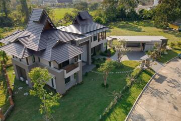 Modern two-story house with unique roof design