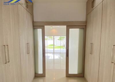Spacious hallway with built-in cupboards