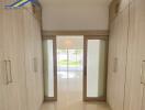 Spacious hallway with built-in cupboards