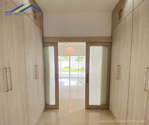 Spacious hallway with built-in cupboards