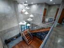 Modern industrial-style hallway with staircase