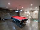 Spacious game room with a pool table