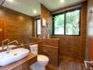 Modern bathroom with large mirror and window