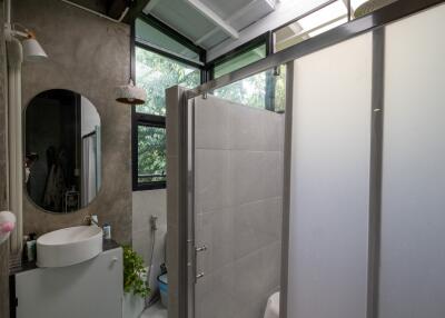 Modern bathroom with frosted glass shower