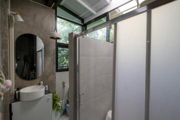 Modern bathroom with frosted glass shower