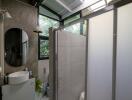 Modern bathroom with frosted glass shower