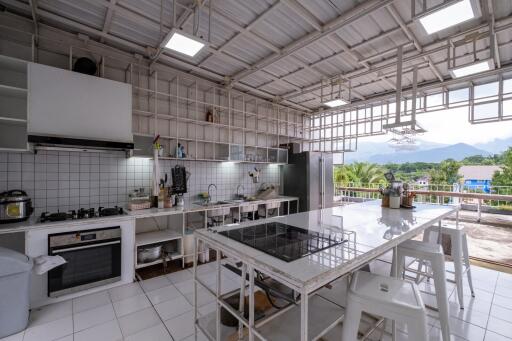 Spacious kitchen with modern appliances and ample storage