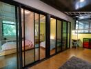 Modern bedroom with loft bed and large windows