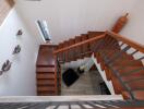 Modern interior staircase with wooden steps and decorative elements