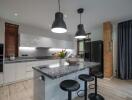 Modern kitchen with island and bar stools