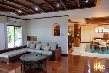 Cozy living room with adjoining dining area