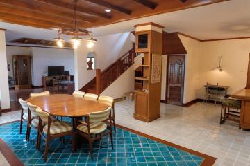 Spacious dining area with wooden accents