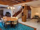 Spacious dining area with wooden accents