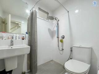 Modern bathroom with shower and toilet