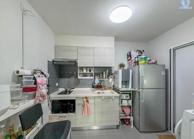 Modern kitchen with stainless steel appliances