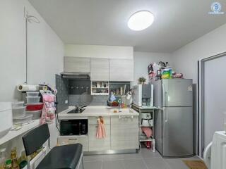 Modern kitchen with stainless steel appliances