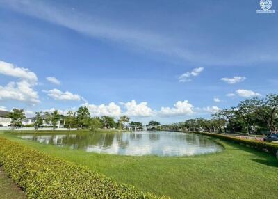 Scenic view of a lake with lush greenery