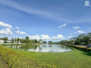 Scenic view of a lake with lush greenery