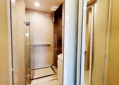 Modern bathroom with glass shower and sliding doors