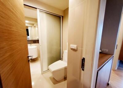 Bathroom with vanity and toilet.