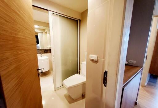 Bathroom with vanity and toilet.