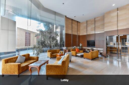 Spacious and modern lobby with seating and natural light