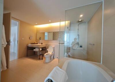 Modern bathroom with bathtub, shower, and sink