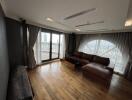 Modern living room with large windows and a view