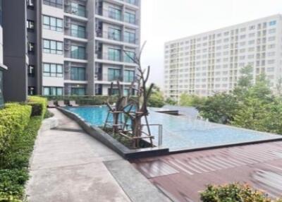 Condominium exterior with pool area