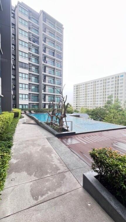 Condominium exterior with pool area