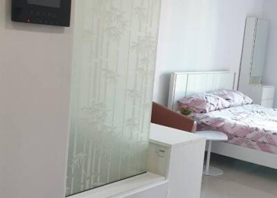 Modern bedroom with integrated electronic control panel