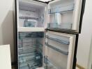 Open refrigerator with visible shelves and compartments