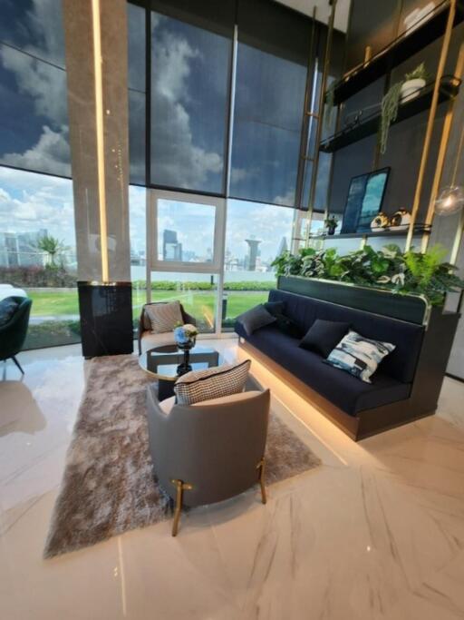 Modern living room with large windows and city view