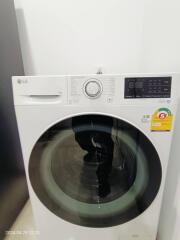 Front-loading washing machine in the laundry room