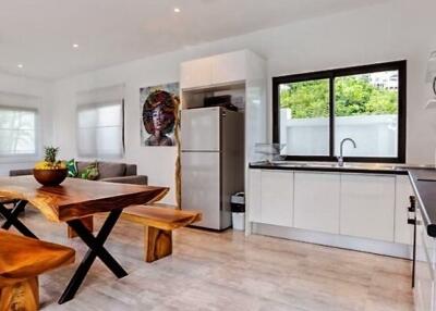 Modern kitchen with dining space