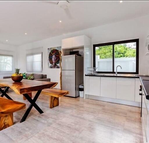 Modern kitchen with dining space