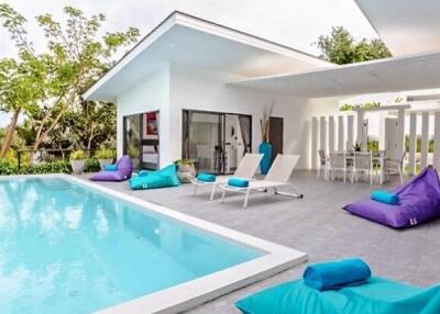 Modern house with pool and lounge area
