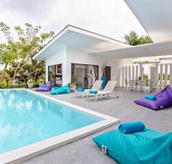 Modern house with pool and lounge area