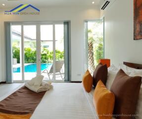 Bedroom with pool view