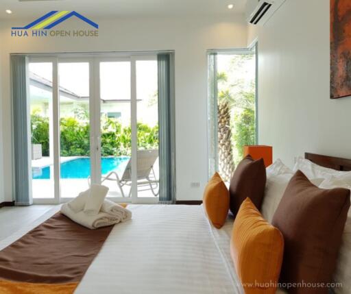 Bedroom with pool view