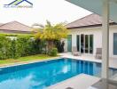 Outdoor swimming pool with adjacent patio and greenery