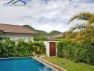 Outdoor view of a house with a swimming pool