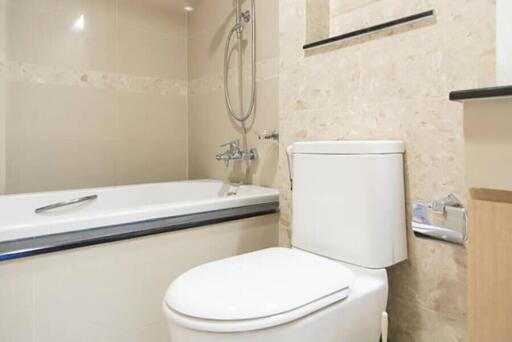 Modern bathroom with bathtub and toilet