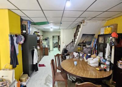 Kitchen and dining area with a round table