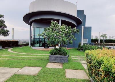 Modern building with curved architecture and landscape