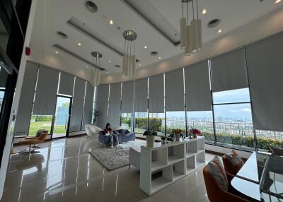 Modern living area with large windows and city view
